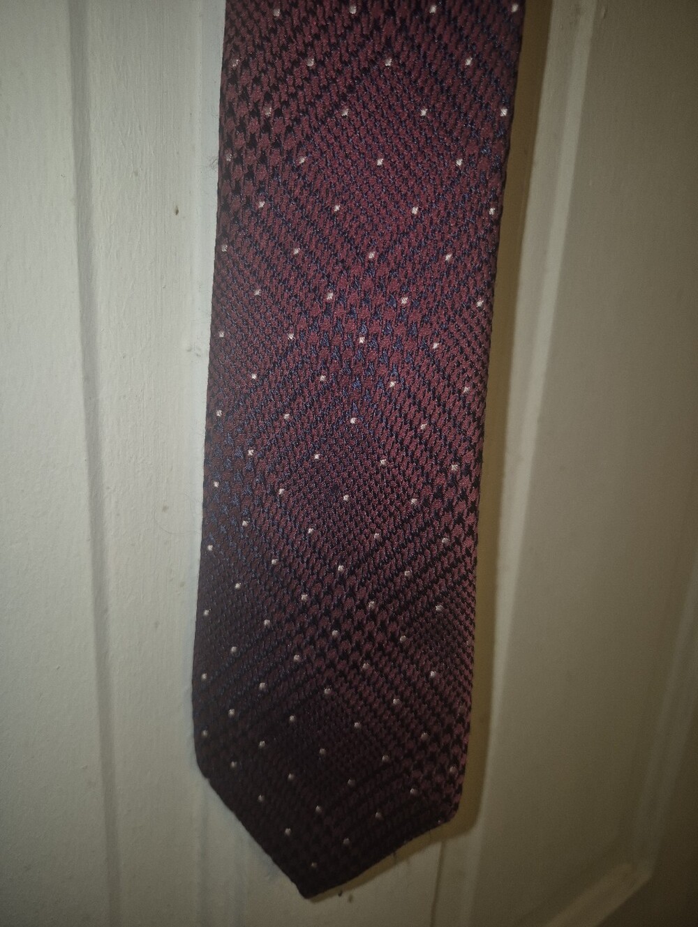Michael Kors silk blend necktie features a burgundy and navy glen-check pattern